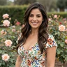 Carmen, 44, a Latina woman in a garden